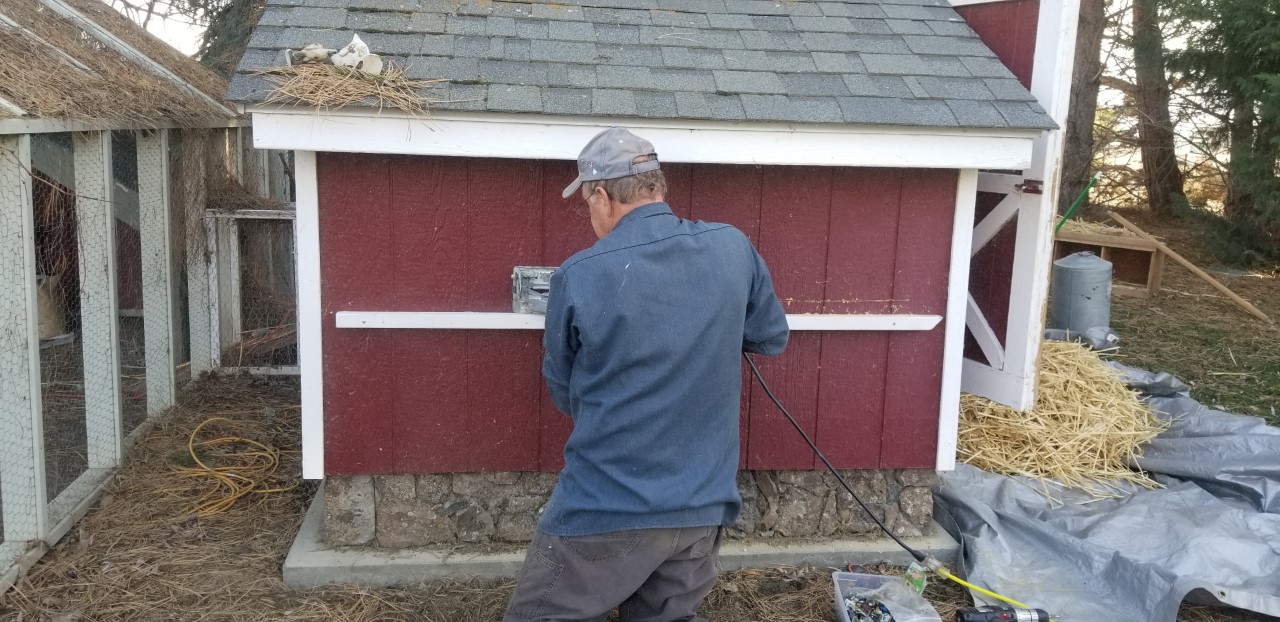 Cutting the opening for the new Nest Box.jpg